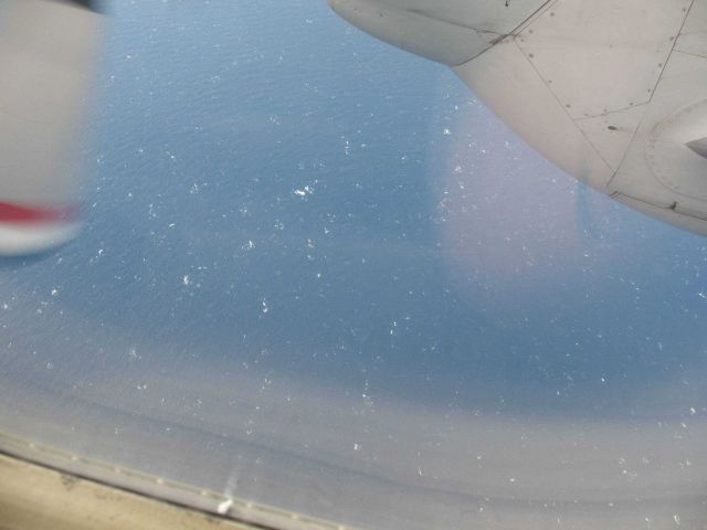 Looking down on a sea surface laced by tropical storm force winds. Picture