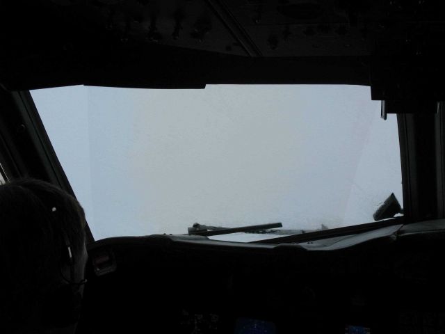 The pilot's view while traversing cumulonimbus clouds. Picture