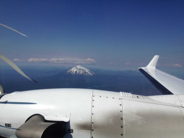 A conical snow-covered Cascade peak as seen from NOAA King Air (BC300 CER) N68RF. Picture