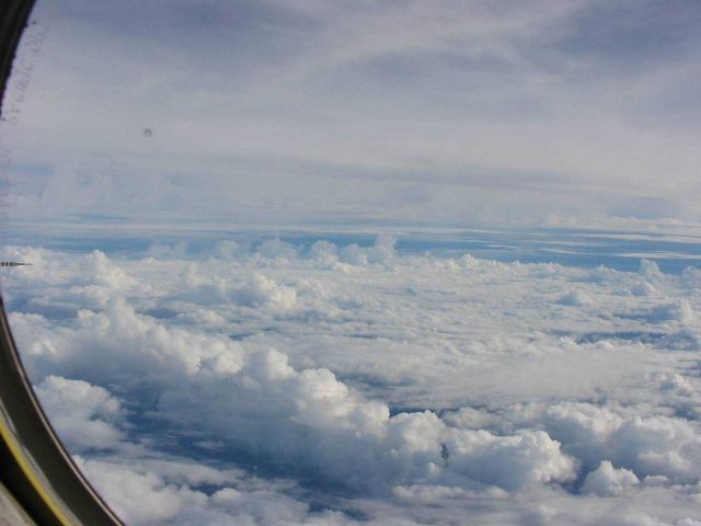 Towering cumulus in vicinity of Tropical Depression Odette. Picture