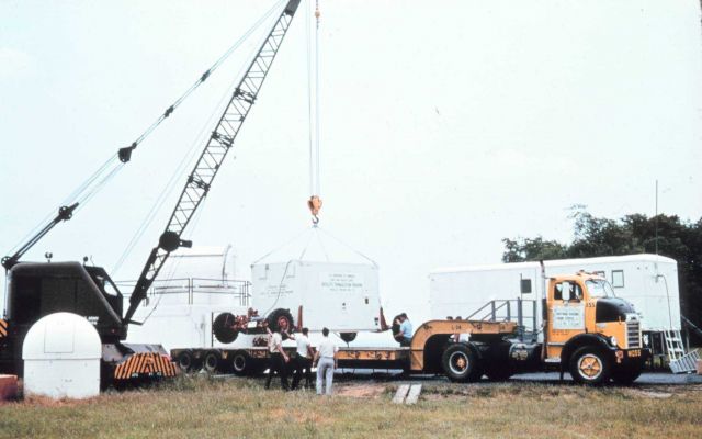 Loading a synchronization console on a truck for shipment at the Beltsville support facility. Picture