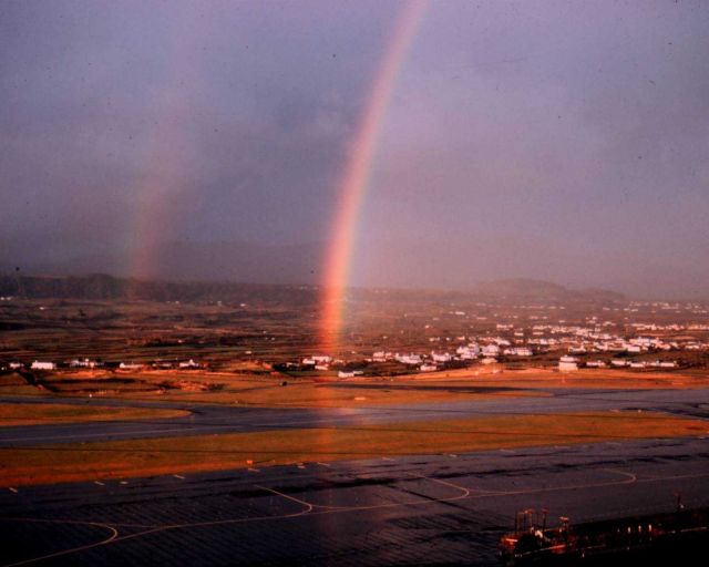 Double rainbow over an unknown airport. Picture