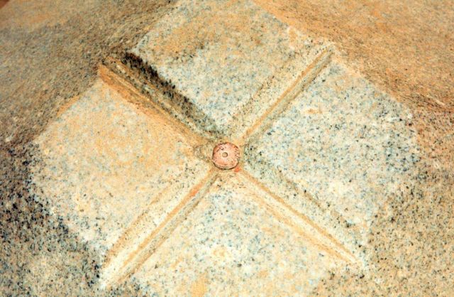 Looking down on a brass plug marking the center of the Jefferson Pier Picture