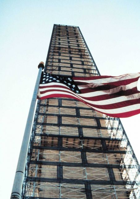 The west side of the Washington Monument while still enveloped with scaffolding. Picture