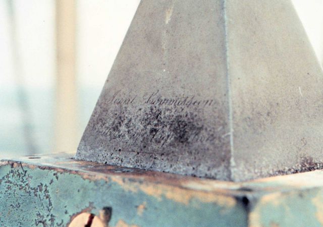 Inscription on the south side of the aluminum tip of the Washington Monument. Picture