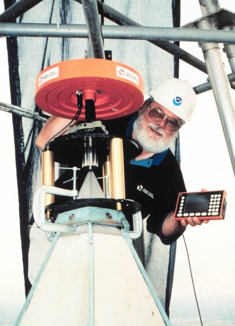 A Spectra Precision GPS antenna atop the Washington Monument with Ellis Veatch of Spectra Precision. Picture