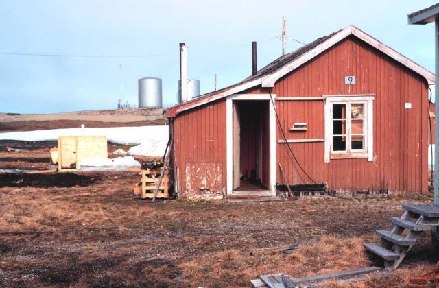 BC-4 observatory and Transit satellite receiver support at Ny Alesund to left of red building. Picture