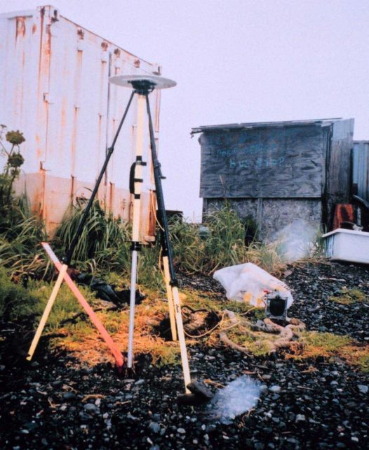GPS antenna set up over mark close to lumber camp in Icy Bay. Picture