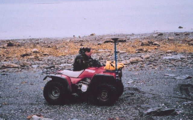 Mike Aslaksen surveying the beach with kinematic GPS mounted on an all-terrain vehicle. Picture