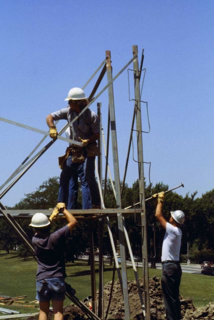 Fred Buck on tower beginning construction of Bilby tower. Picture