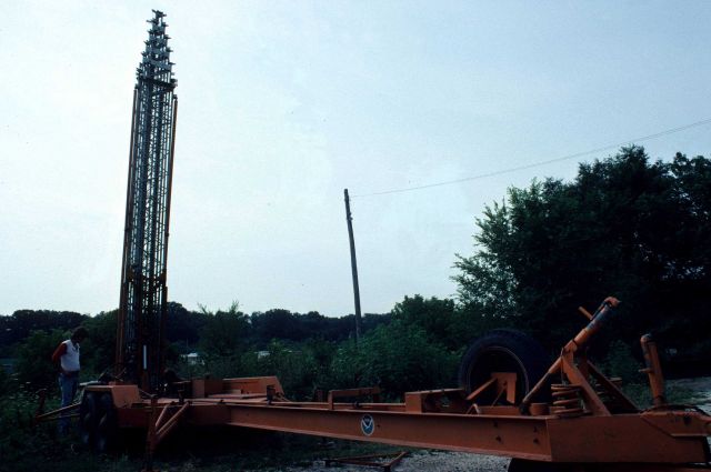 TMT being erected next to pre-erected telephone pole. Picture