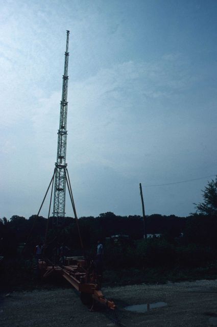 TMT being telescoped next pre-erected telephone pole. Picture