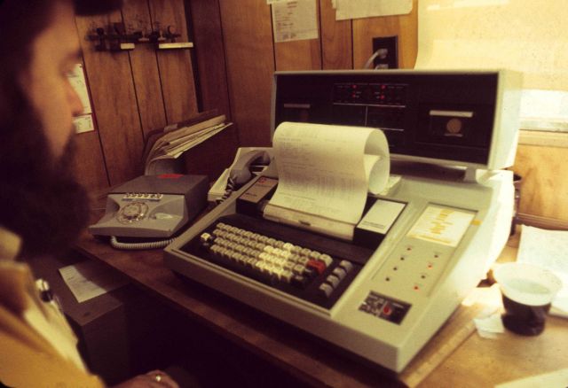 Computer Dean Wegner working up triangulation observations on a Texas Instruments terminal Picture