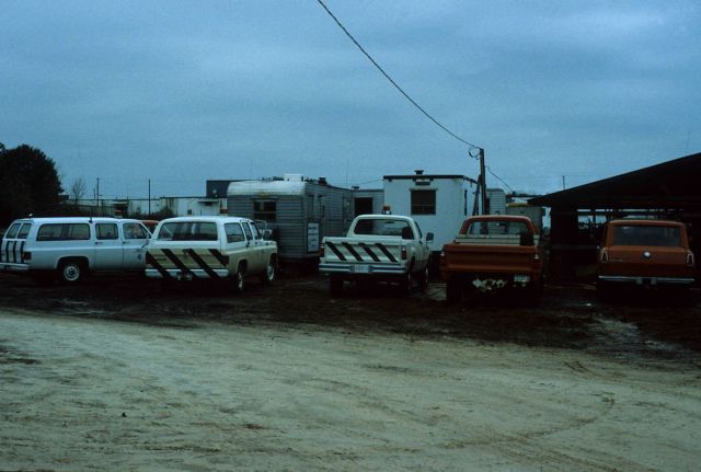 Party G-19 office trailers, trucks, and headquarters. Picture
