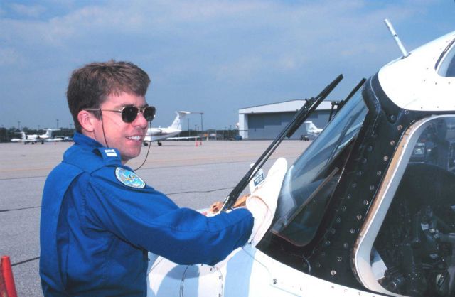 Lieutenant Mark Hickey taking care of details that make for safe flights on Rockwell Turbo Commander N53RF. Picture