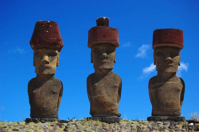 Moai with red topknot hats at Anakena Ahu Na Picture