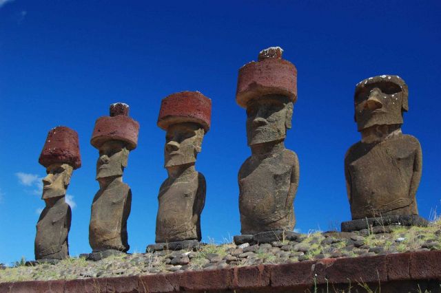 Moai with red topknot hats at Anakena Ahu Na Picture
