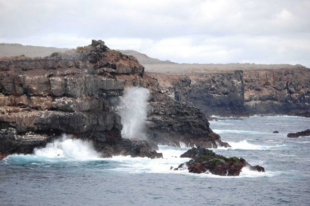 The Punta Suarez blowhole as seen from seaward of Espagnola Island. Picture