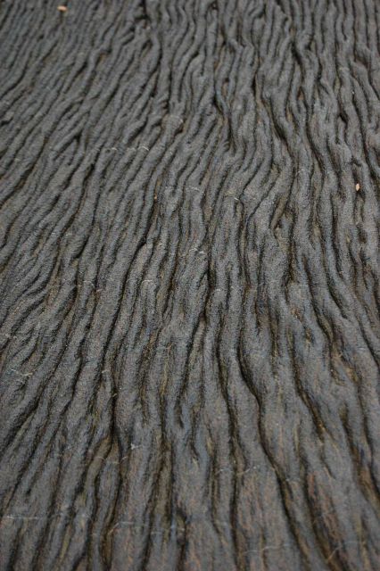 Pahoehoe lava looking like strands of rope. Picture