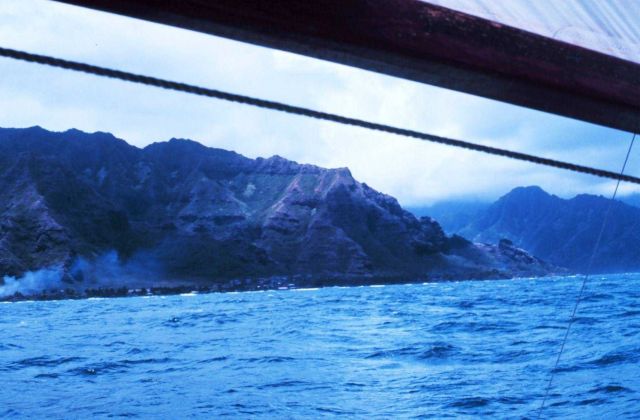 Catamaran sailing off Hawaiian island Picture