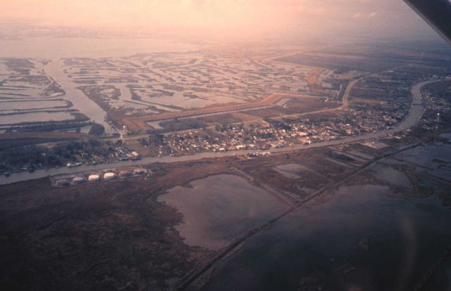 Homes and businesses built along the levee ridge of Bayou Lafourche. Picture