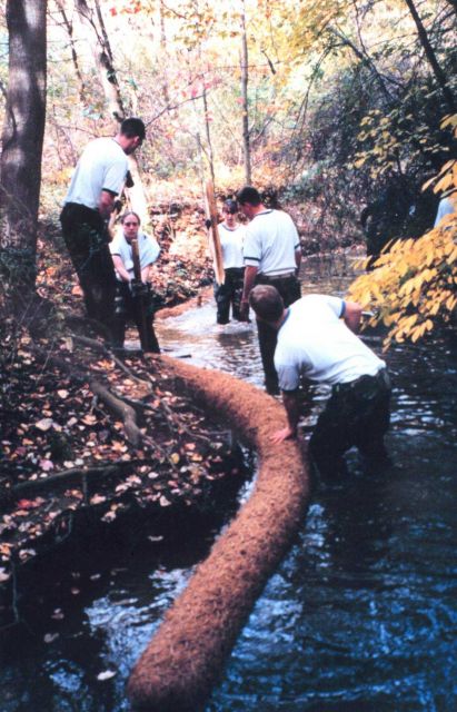 Installing Biologs to abate erosion problems along Spa Creek. Picture