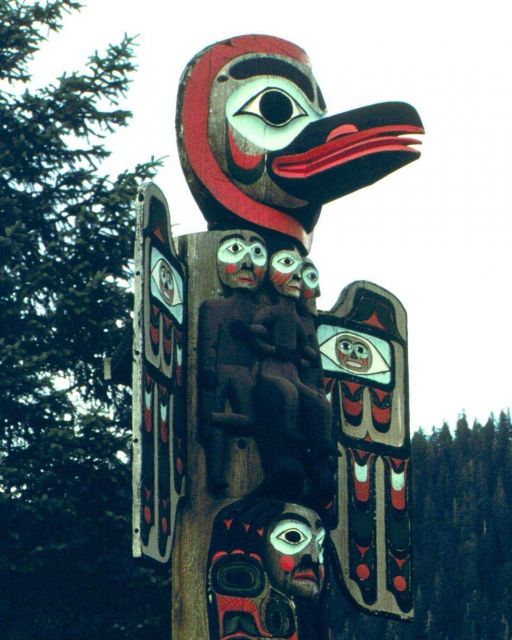 Raven and Sun Totem at Saxman Totem Park outside of Ketchikan. Picture