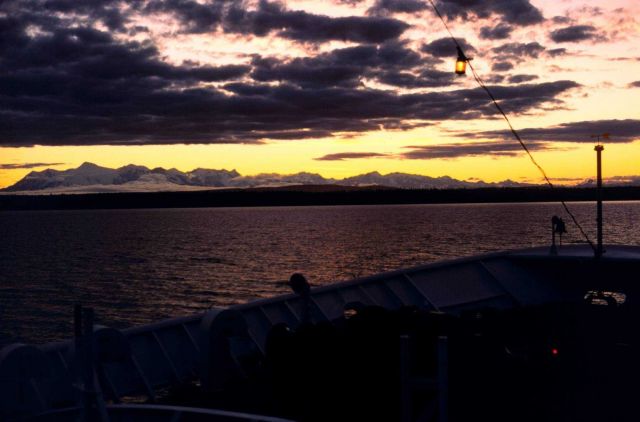 A sunset in Upper Cook Inlet taken from the bow of the FAIRWEATHER. Picture