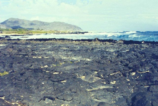 Black lava meets the sea. Picture