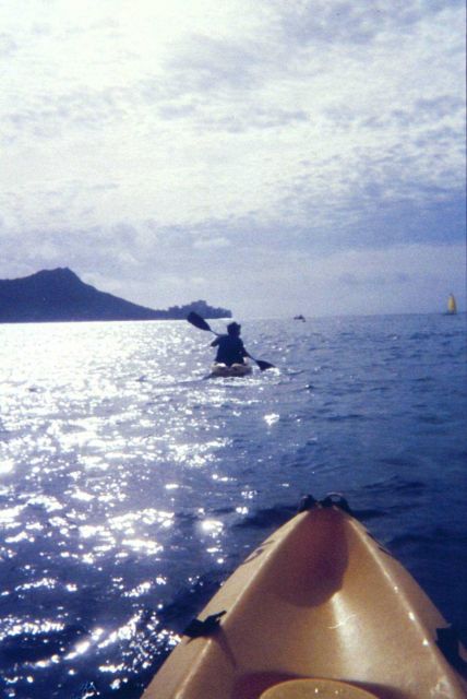 Kayaking off Waikiki with Diamondhead in the background. Picture