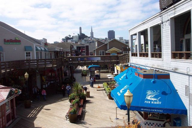 A view of Coit Tower and the Transamerica Pyramid from Pier 39 looking to the west. Picture