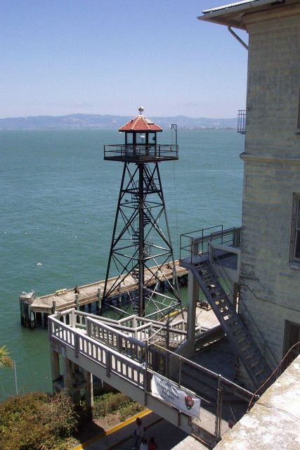 An Alcatraz guard tower overlooking the pier area. Picture