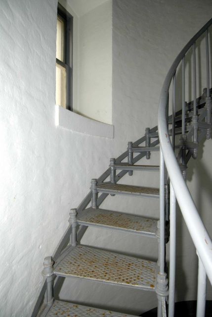 The spiral staircase leading to the light at the Point Conception Lighthouse. Picture