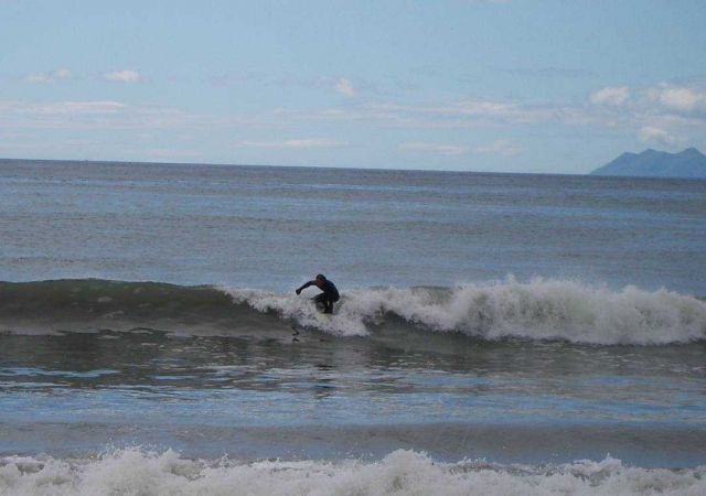 NOAA Ship RAINIER personnel surfing on Kodiak Island Picture