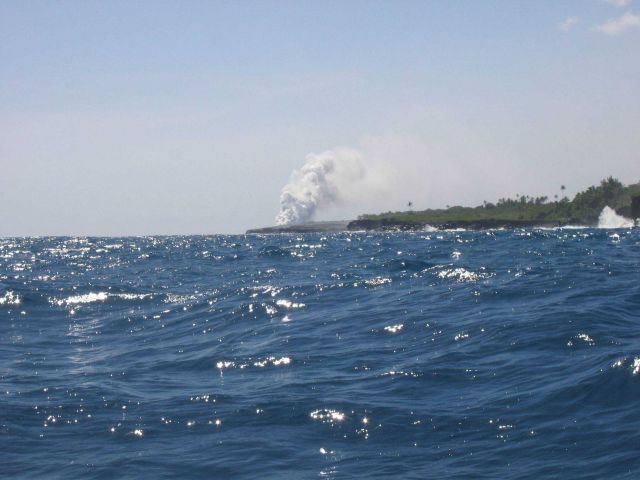 Lava flow entering the sea on SE coast of Hawaii. Picture
