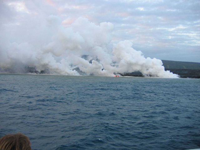Lava flow entering the sea on SE coast of Hawaii. Picture