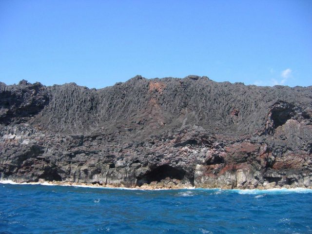 Recently cooled lava where it meets the sea near South Point of Hawaii. Picture
