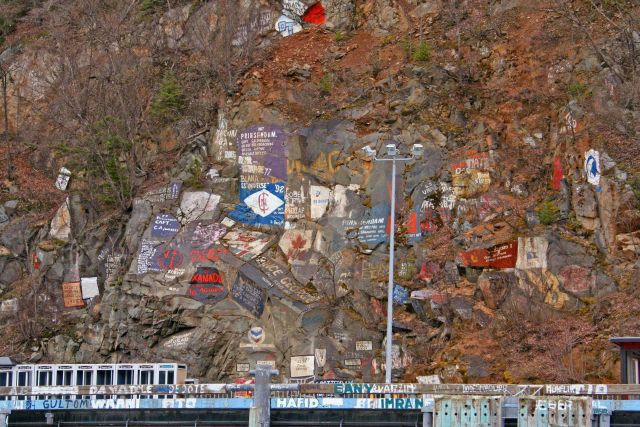 The dock at Skagway with artwork commemorating the ships that have visited here Picture