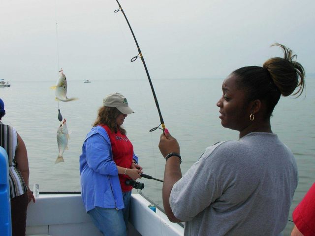 Catching fish two at a time on a calm Chesapeake Bay day. Picture