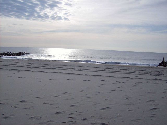Early morning sun reflecting off the ocean at Cape May. Picture