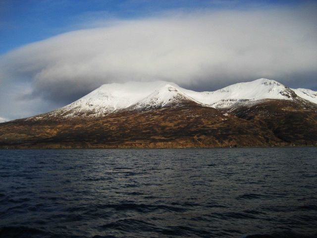 Clouds over snow-covered mountains Picture