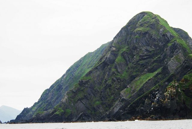 Bent, broken, uplifted rock formations on Big Koniuji Island Picture