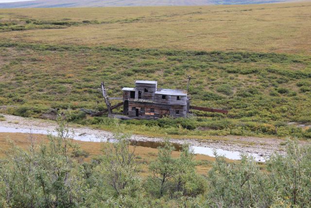 A deserted gold dredge outside Nome, Alaska, in the watershed of the Nome River. Picture