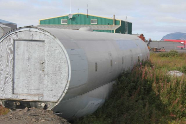 Remains of cargo plane used for storage at Unalakleet Airport. Picture