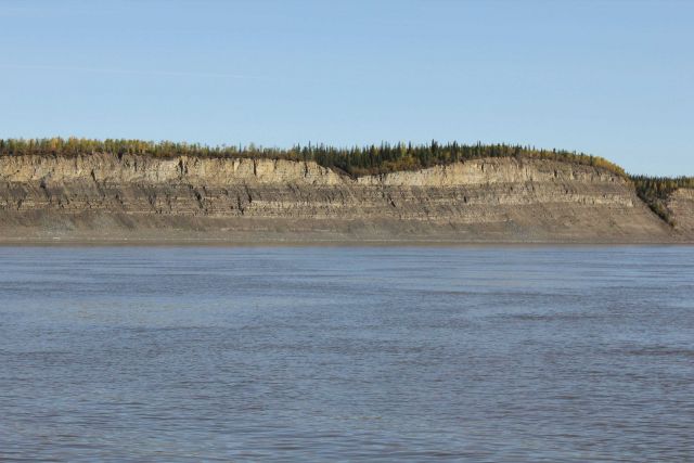 A scene along the MacKenzie River, the second longest river in North America and the largest north flowing river. Picture