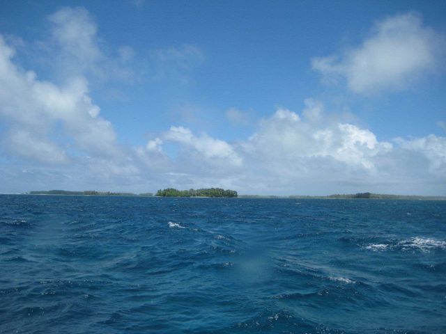 Palmyra Island seen looking astern from the NOAA Ship Hi'ialakai as it proceeds to its next project area. Picture