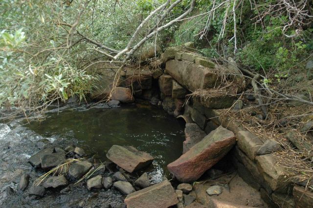 This aging, undersized culvert that conveyed Stony Brook under Route 6A restricted the tidal flow to the salt marsh and presented an obstacle for fish Picture