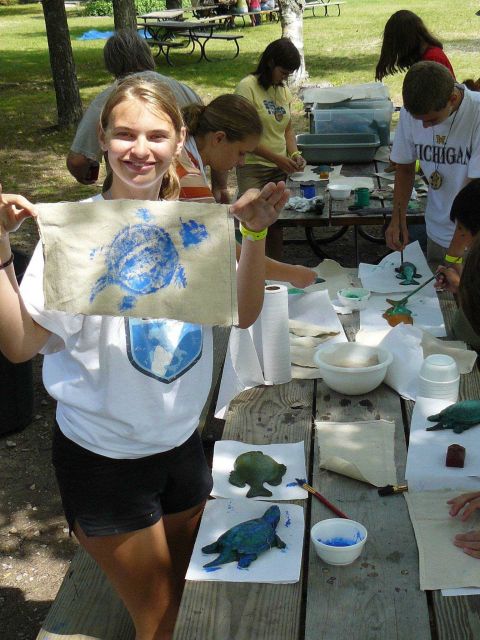 A Sea Grant sponsored function at which students produce artwork highlighting the fauna of the Great Lakes. Picture