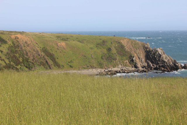 A rocky outcrop at the south end of the small cove at Fort Ross. Picture