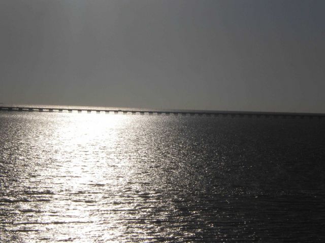 Lake Ponchartrain Causeway looking into the sunglint of late afternoon. Picture